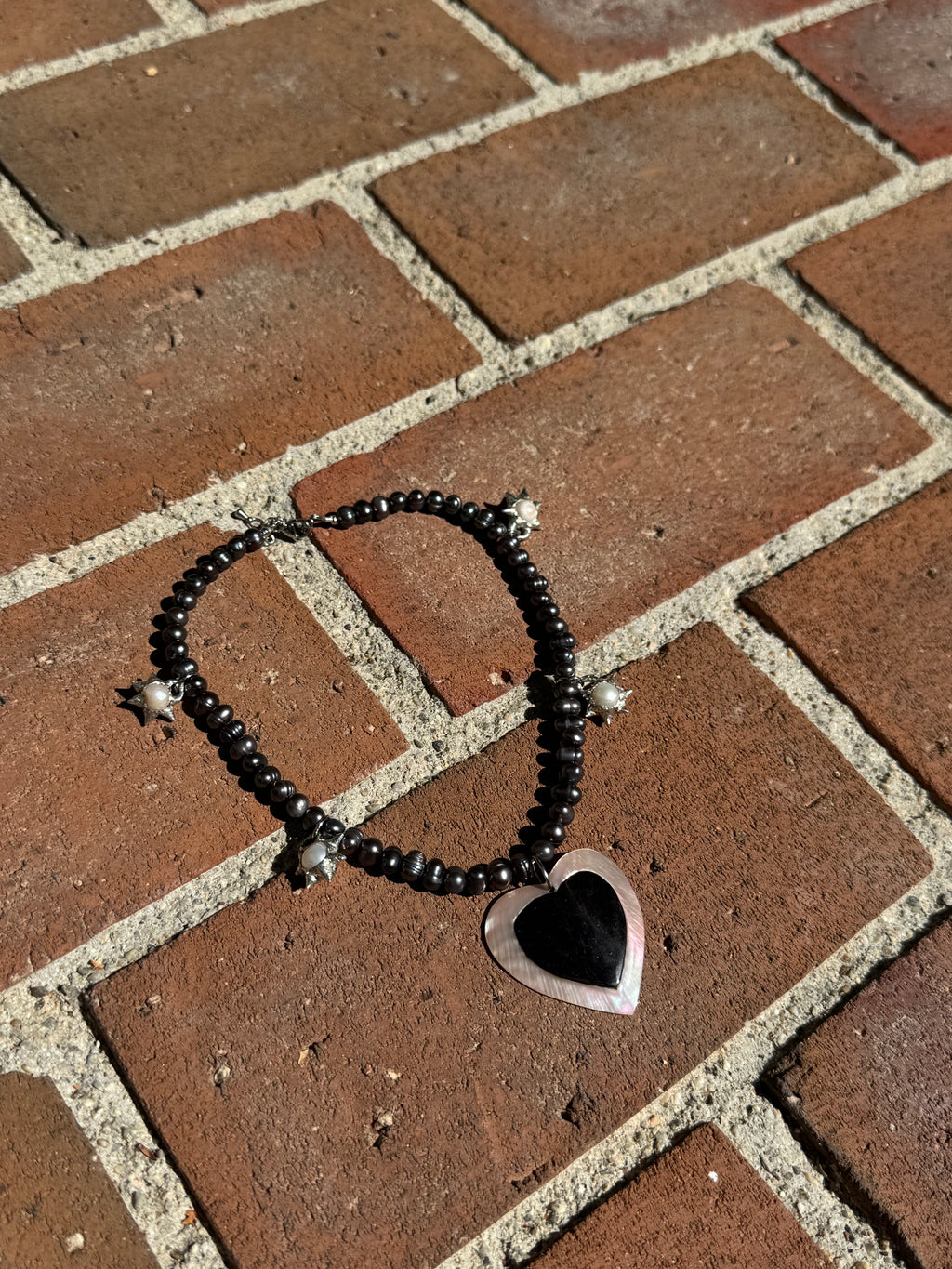 heart tusk shell with spiky pearls