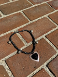 heart tusk shell with spiky pearls
