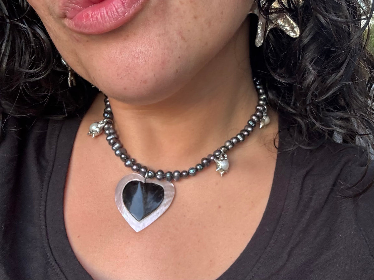 heart tusk shell with spiky pearls
