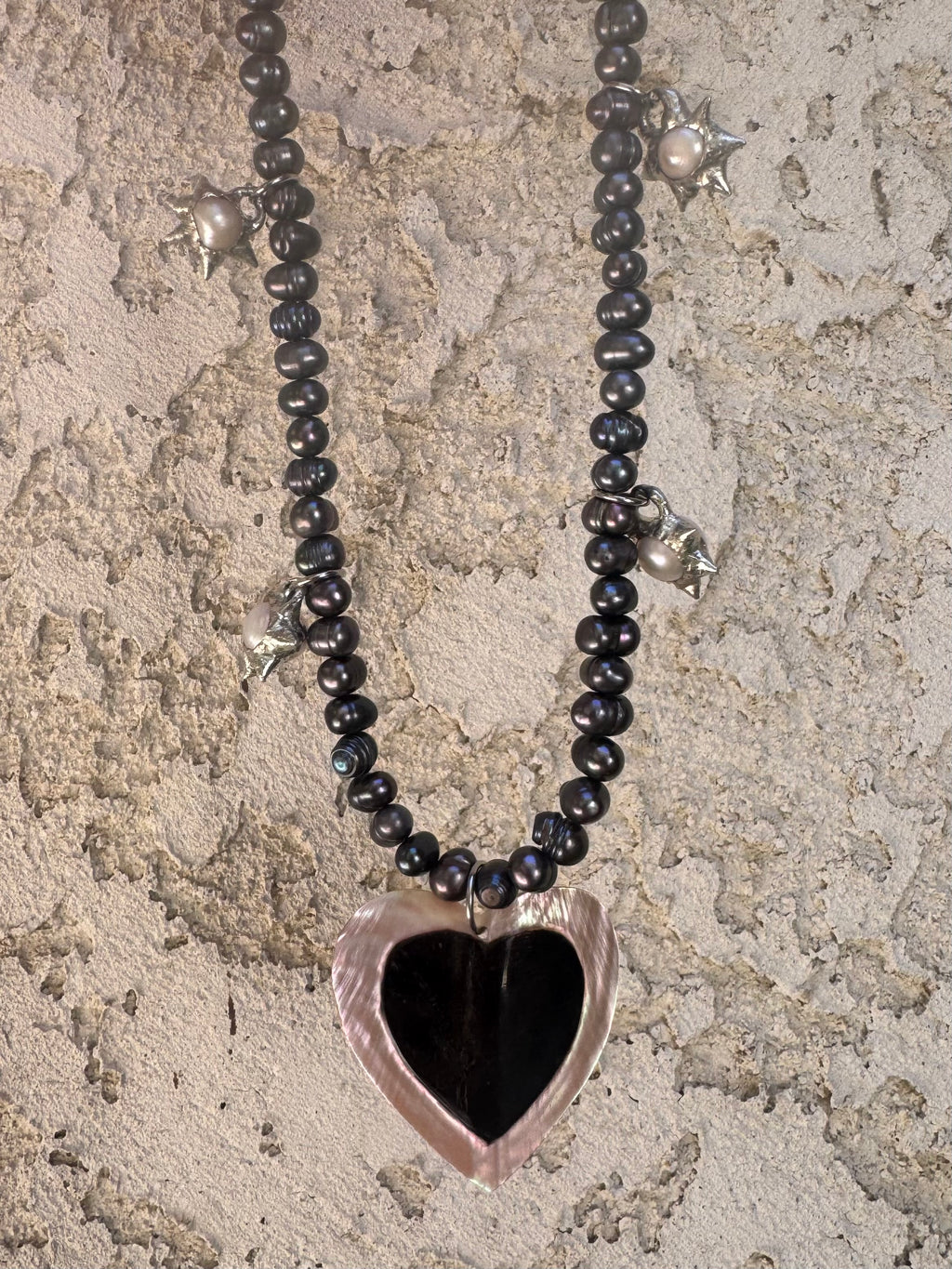 heart tusk shell with spiky pearls